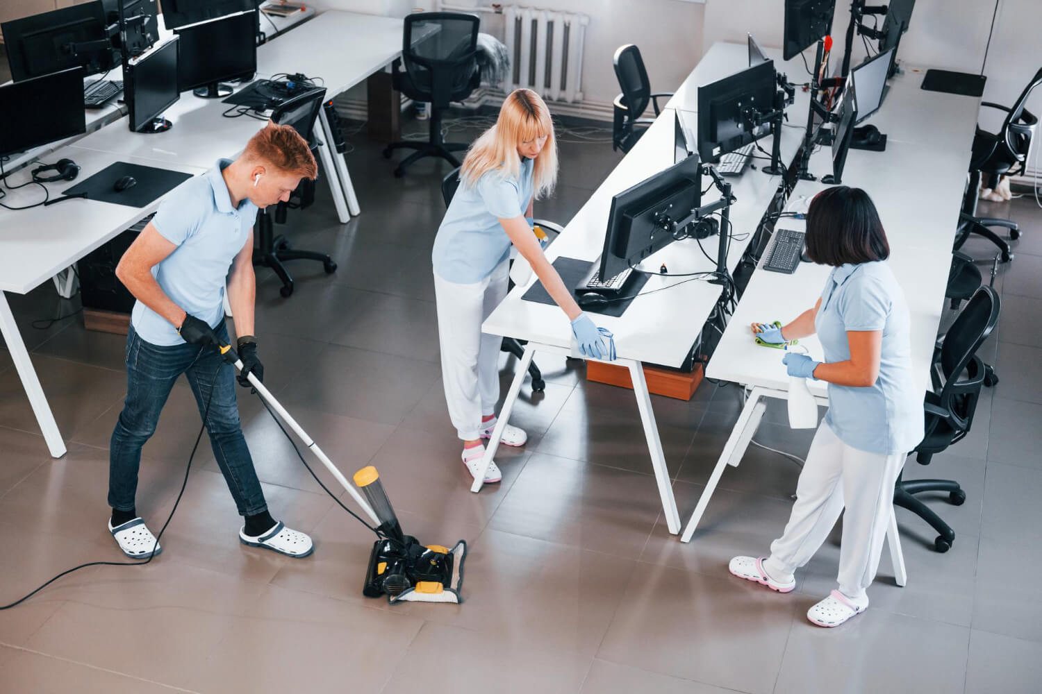 commercial cleaning Islington office team disinfecting workspace